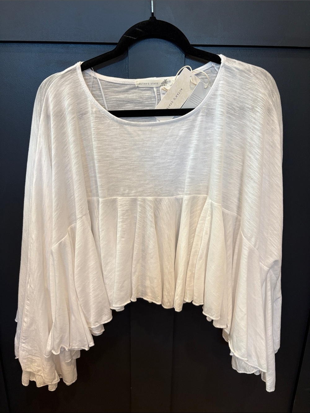 691. Altar'd State White Ruffle-Hem Peasant Top